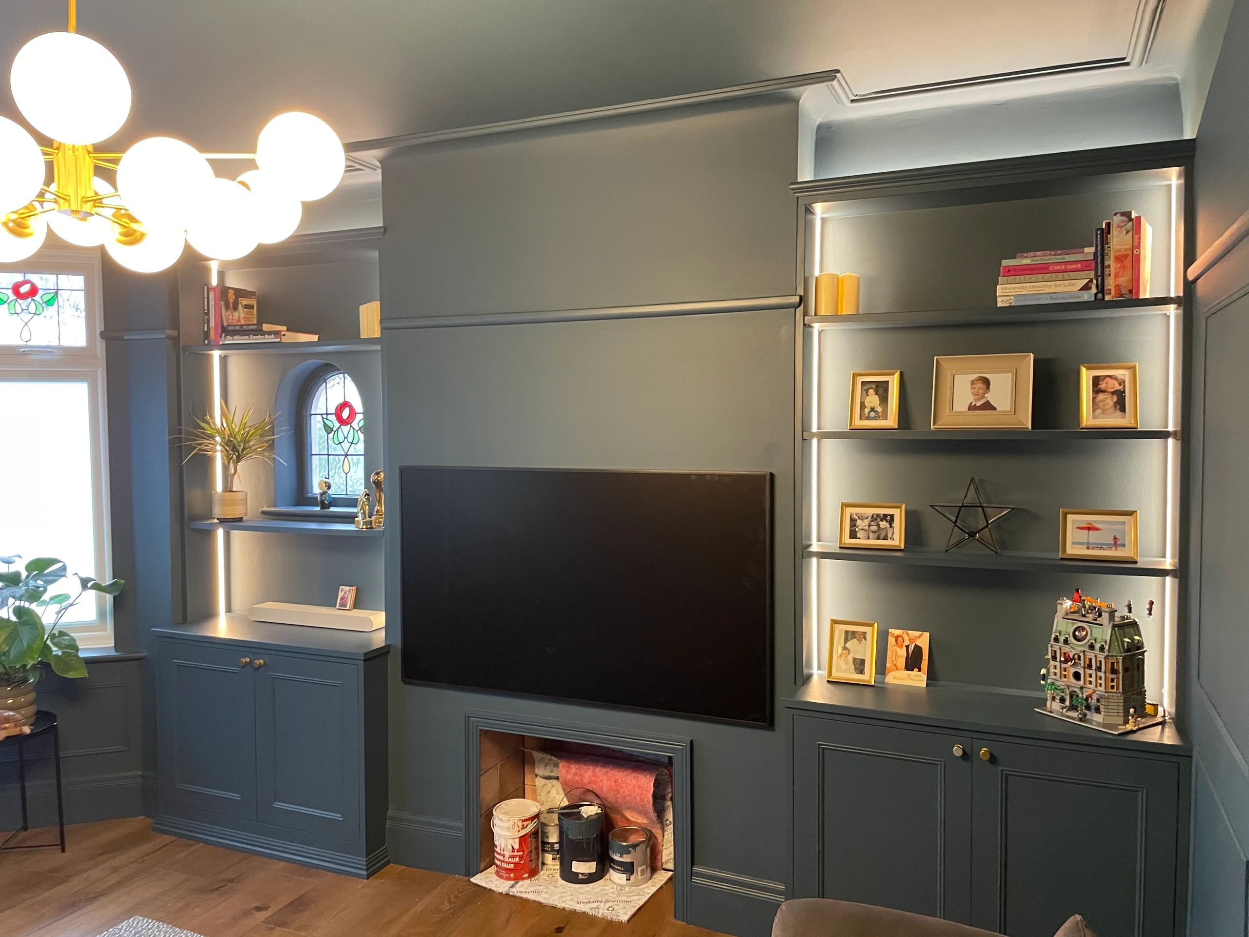 Modern living room with feature wall TV unit